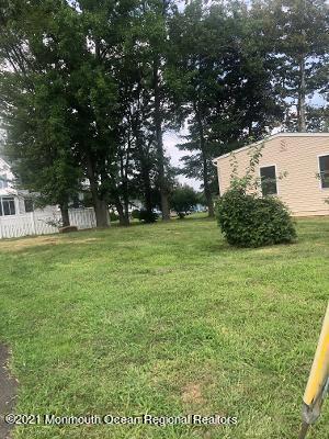 90 County Road Cliffwood, NJ 07721 - Photo 11 of 12 a view of a tree in a yard