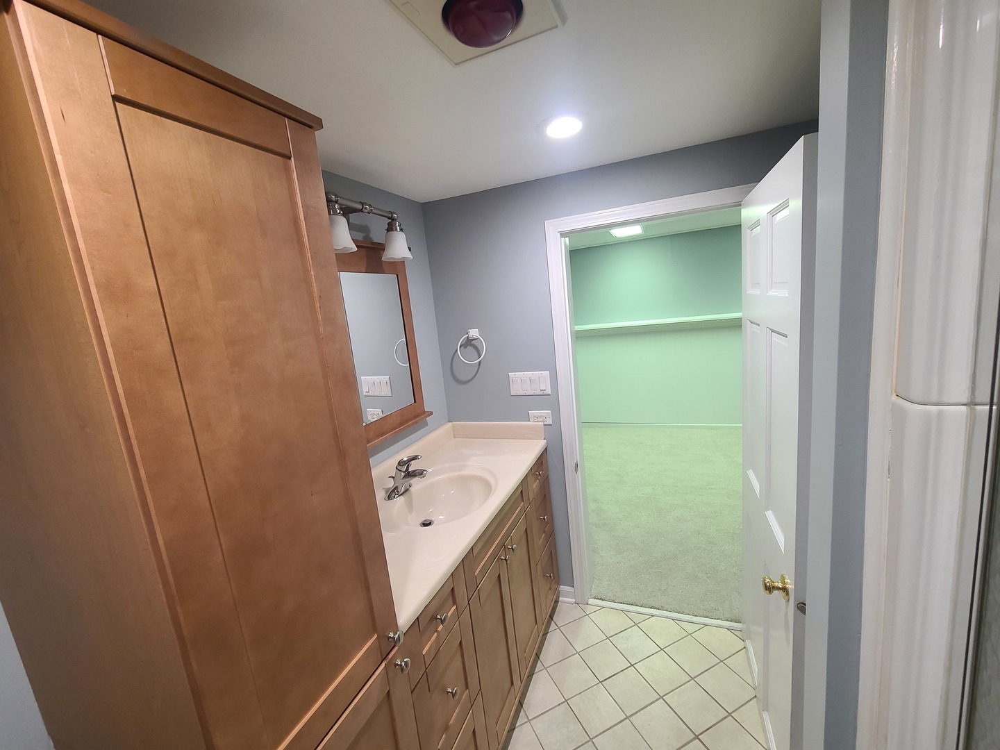 630 Greenview Road Itasca, IL 60143 - Photo 13 of 15 a bathroom with a sink a toilet and shower