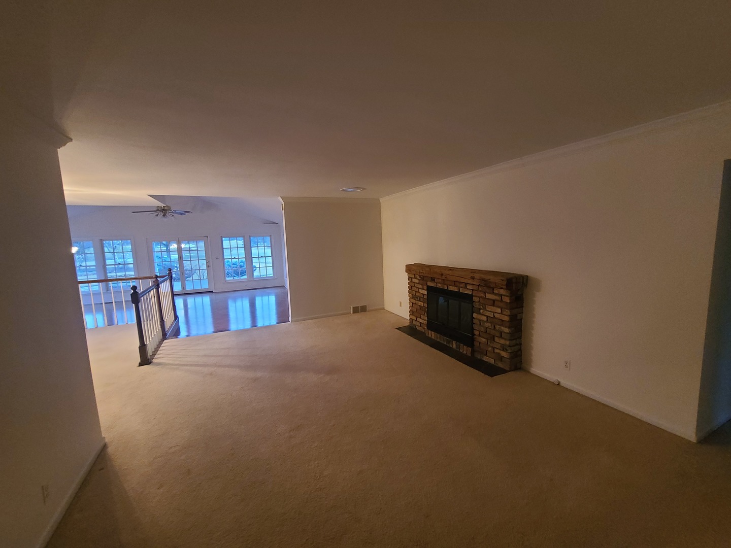 630 Greenview Road Itasca, IL 60143 - Photo 4 of 15 a view of empty room with floor to ceiling window and fireplace