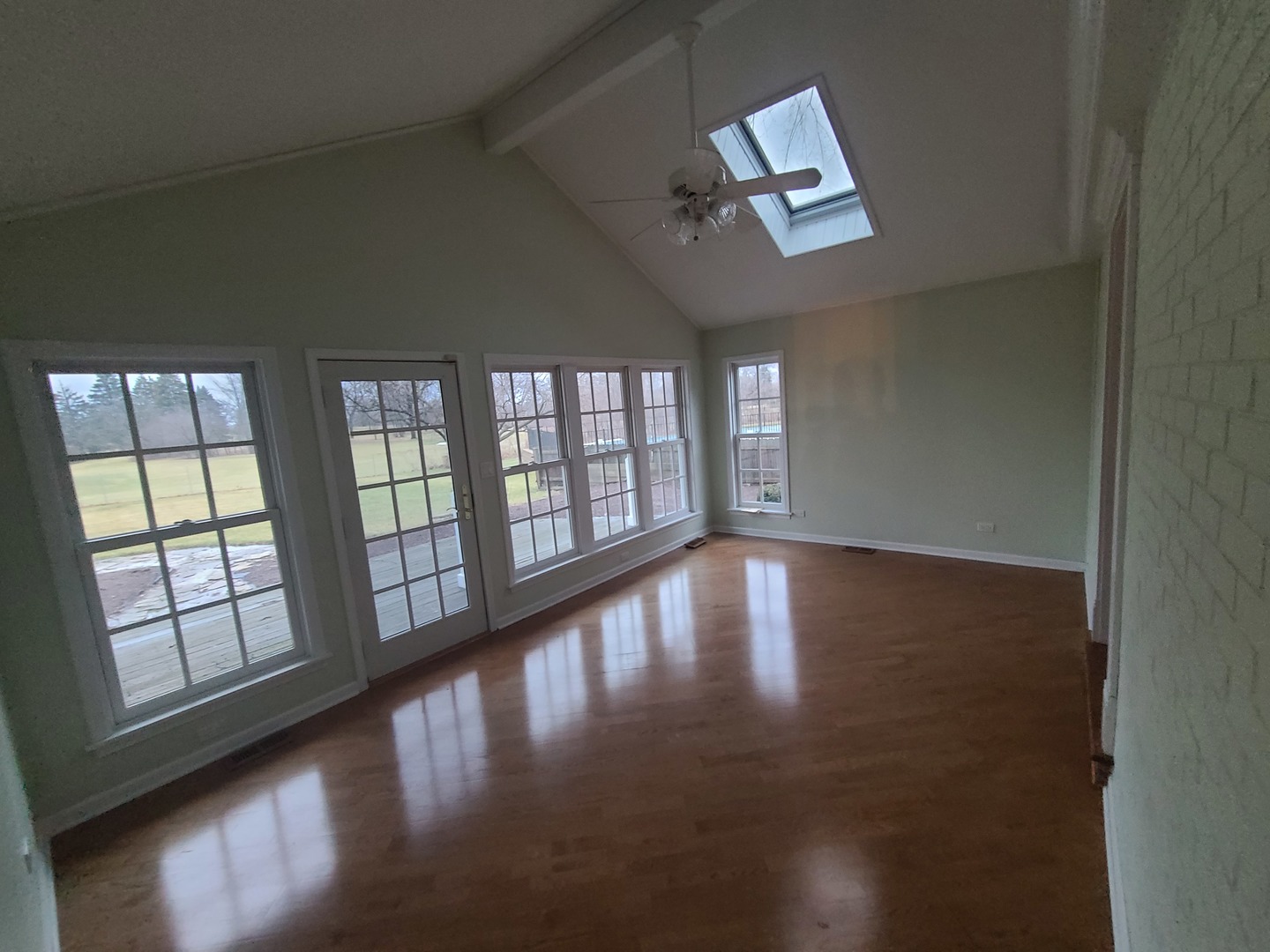 630 Greenview Road Itasca, IL 60143 - Photo 5 of 15 wooden floor in an empty room with a window