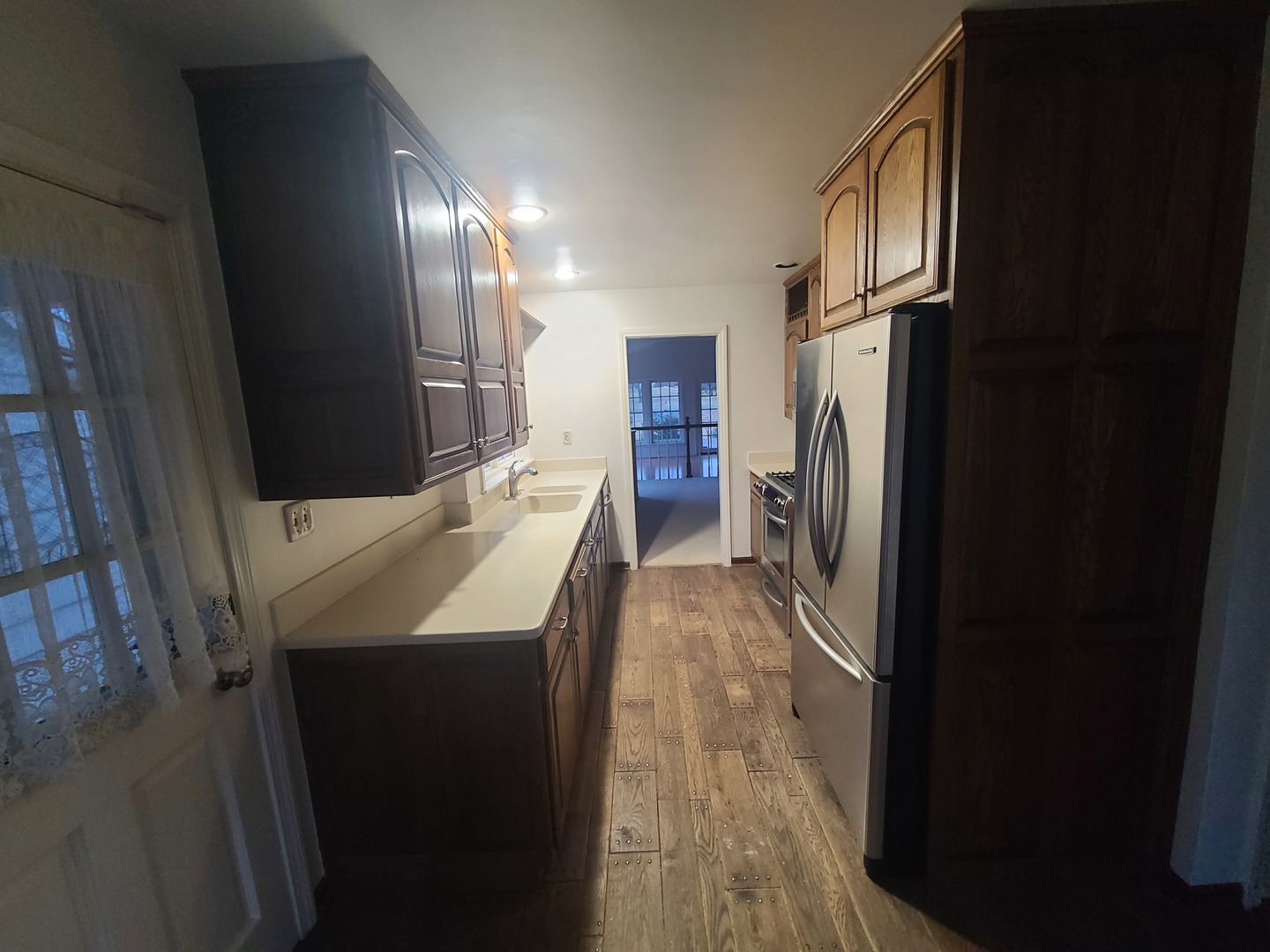 630 Greenview Road Itasca, IL 60143 - Photo 6 of 15 a kitchen with a sink a refrigerator and a stove