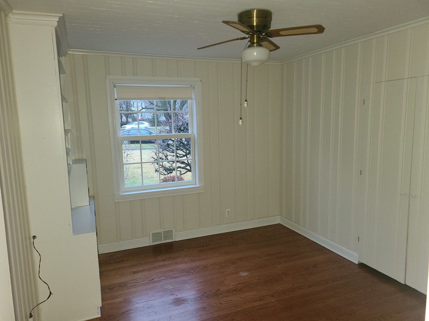 630 Greenview Road Itasca, IL 60143 - Photo 8 of 15 wooden floor in an empty room with a window