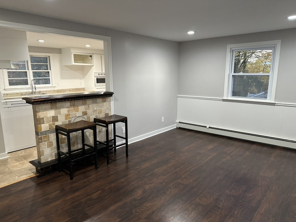 3 Tryon Road Norwalk, CT 06851 - Photo 5 of 25 a view of room with window and wooden floor