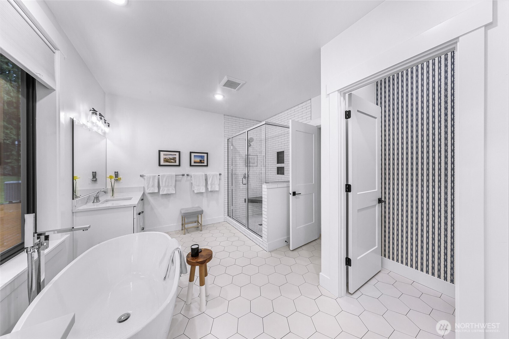 4336 Meander Lane Langley, WA 98260 - Photo 18 of 36 a large white bathroom with a bathtub and mirror