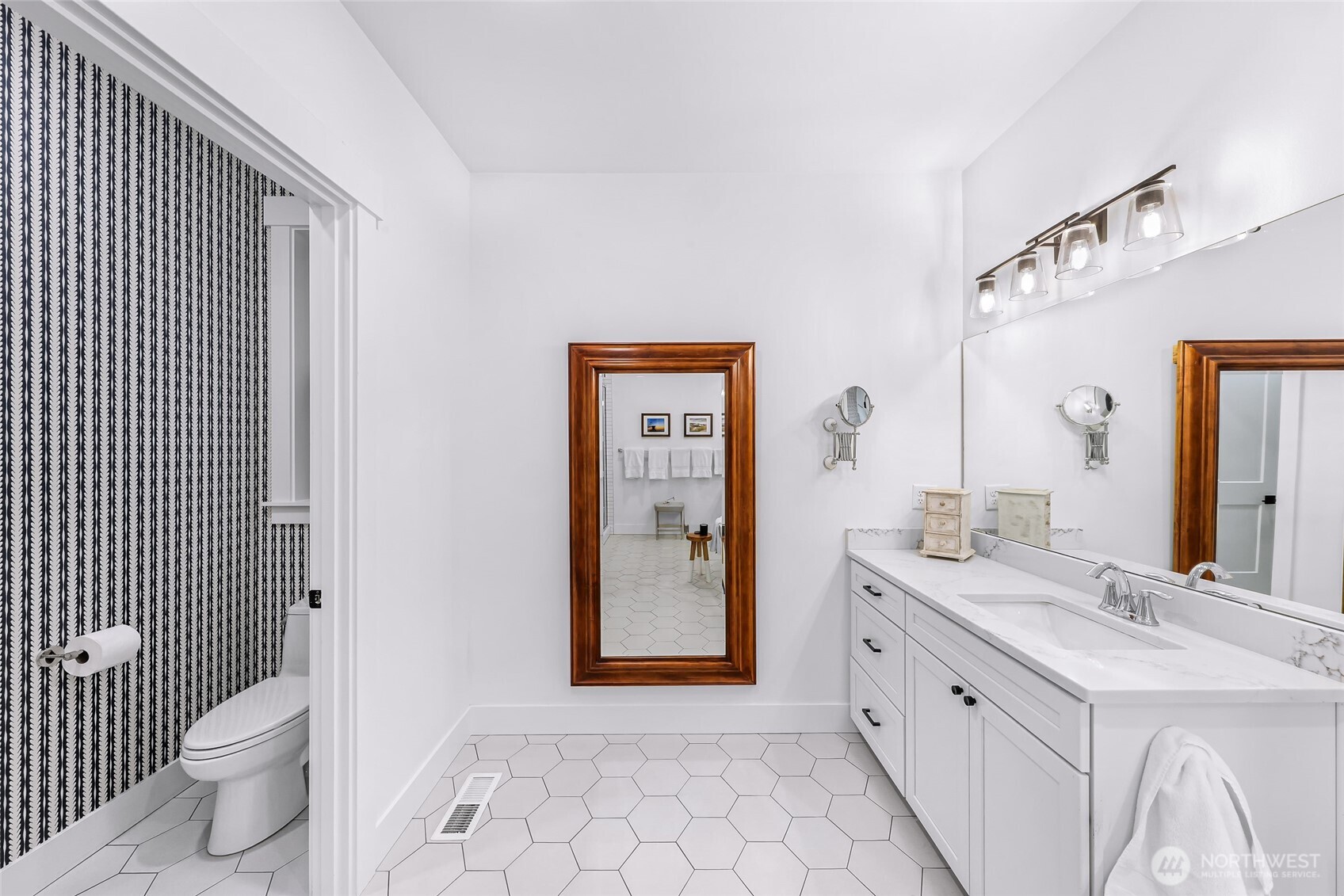 4336 Meander Lane Langley, WA 98260 - Photo 21 of 36 a spacious bathroom with a double vanity sink toilet and shower