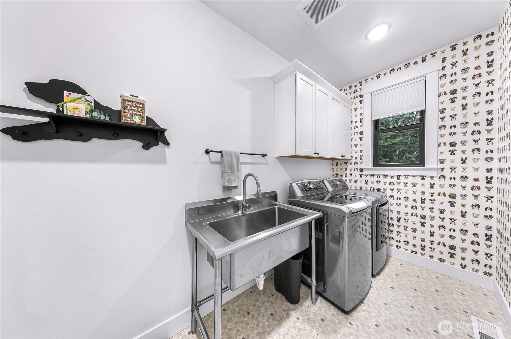 4336 Meander Lane Langley, WA 98260 - Photo 22 of 36 a kitchen with a sink and cabinets