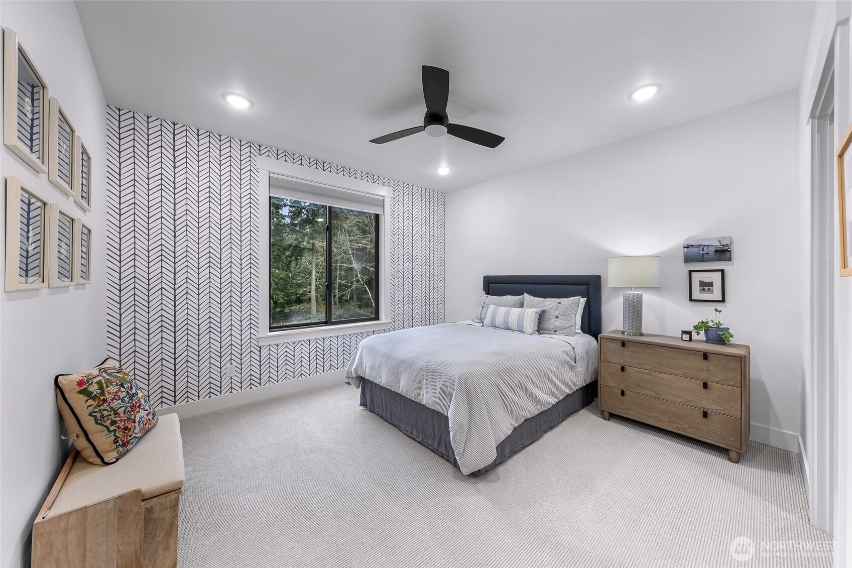 4336 Meander Lane Langley, WA 98260 - Photo 26 of 36 a spacious bedroom with a bed and a window