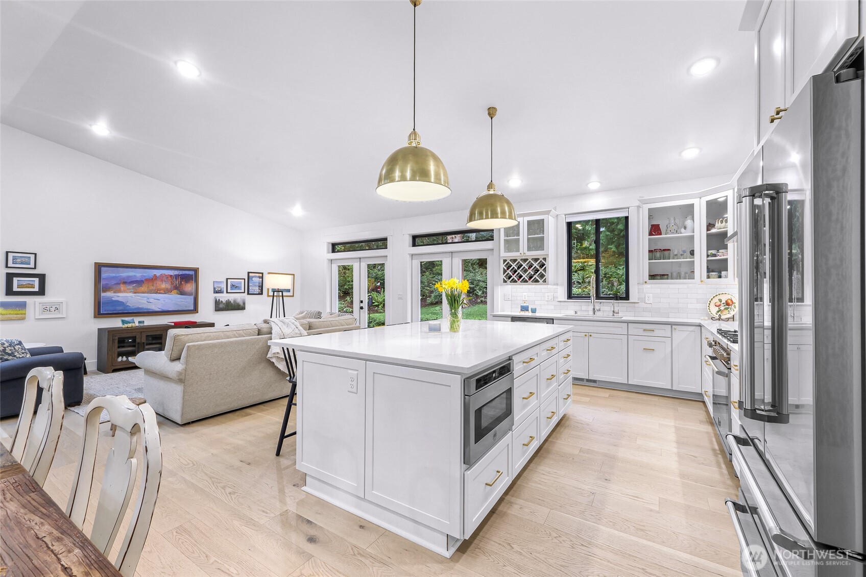 4336 Meander Lane Langley, WA 98260 - Photo 10 of 36 a kitchen with stainless steel appliances granite countertop a stove and a sink