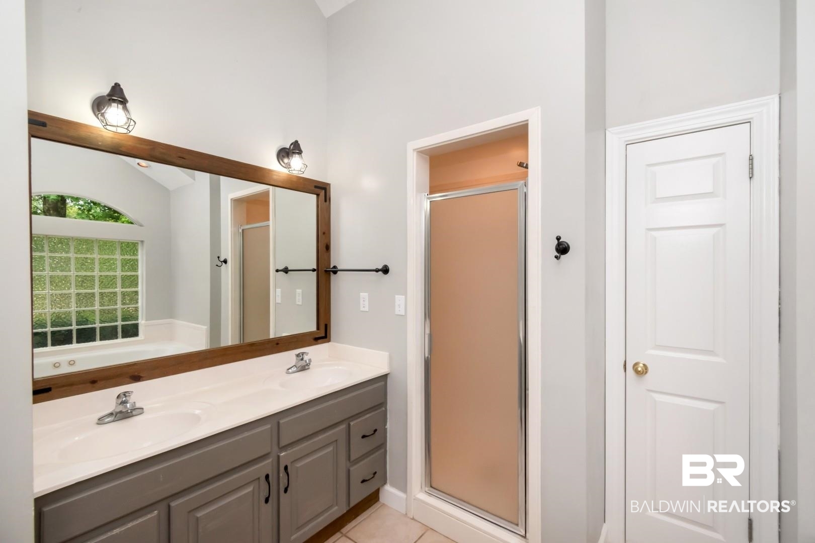 10691 Hunters Ridge Drive Mobile, AL 36695 - Photo 16 of 37 Dual sink vanity with grey cabinetry and light-toned countertops