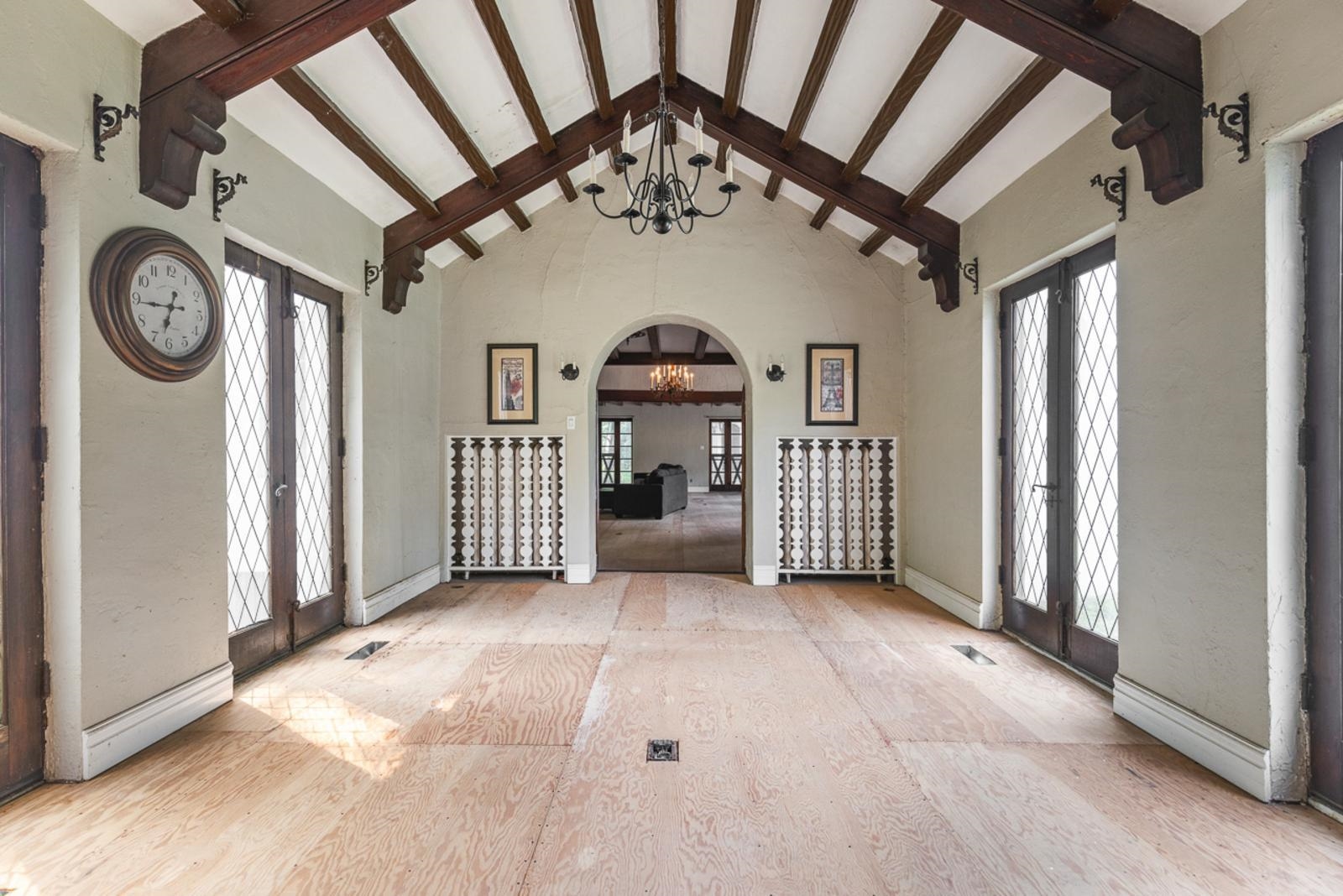 1511 West Demeter Drive Freeport, IL 61032 - Photo 29 of 78 a view of a hallway with entryway chandelier entryway and wooden floor