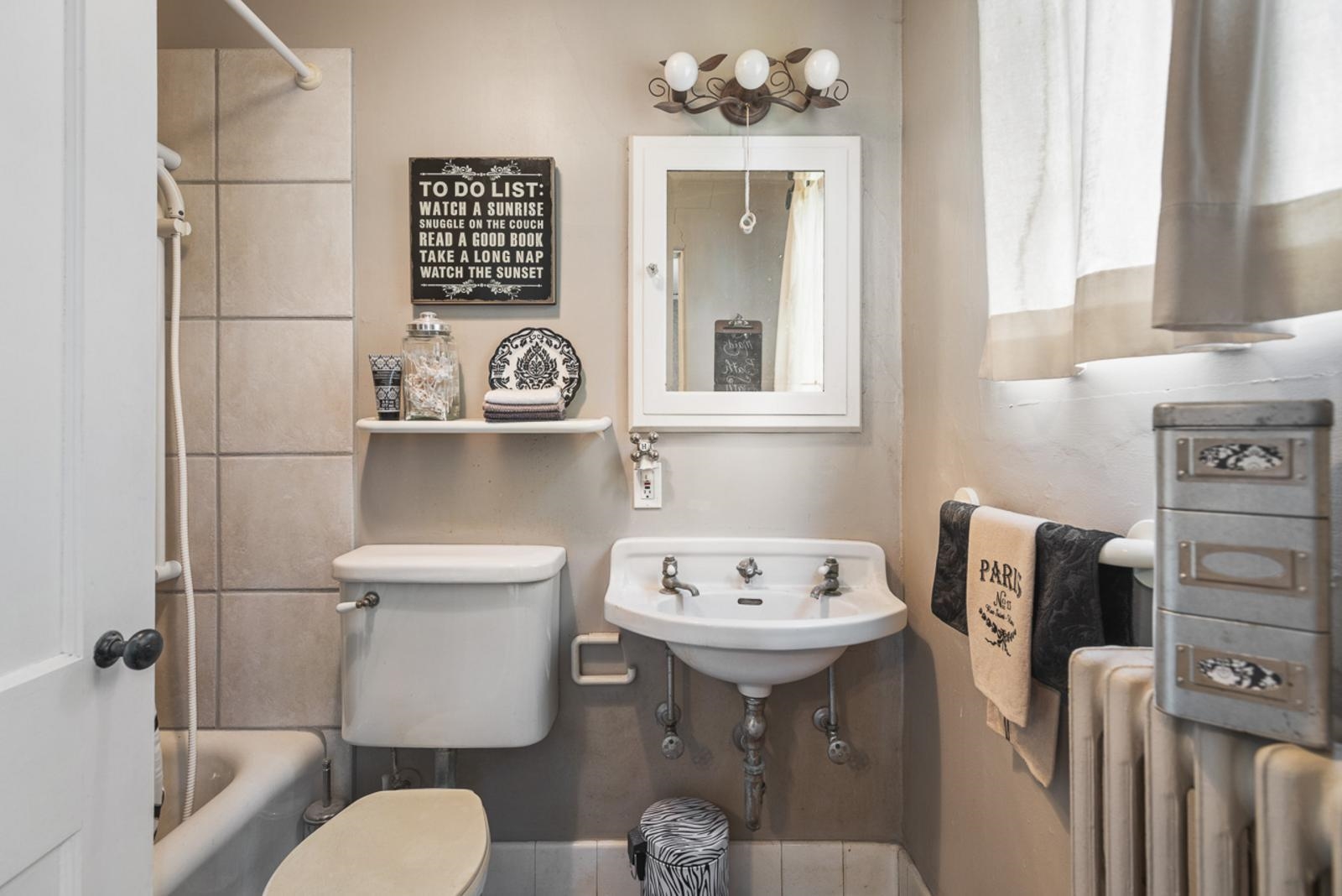 1511 West Demeter Drive Freeport, IL 61032 - Photo 35 of 78 a bathroom with a sink toilet and a mirror