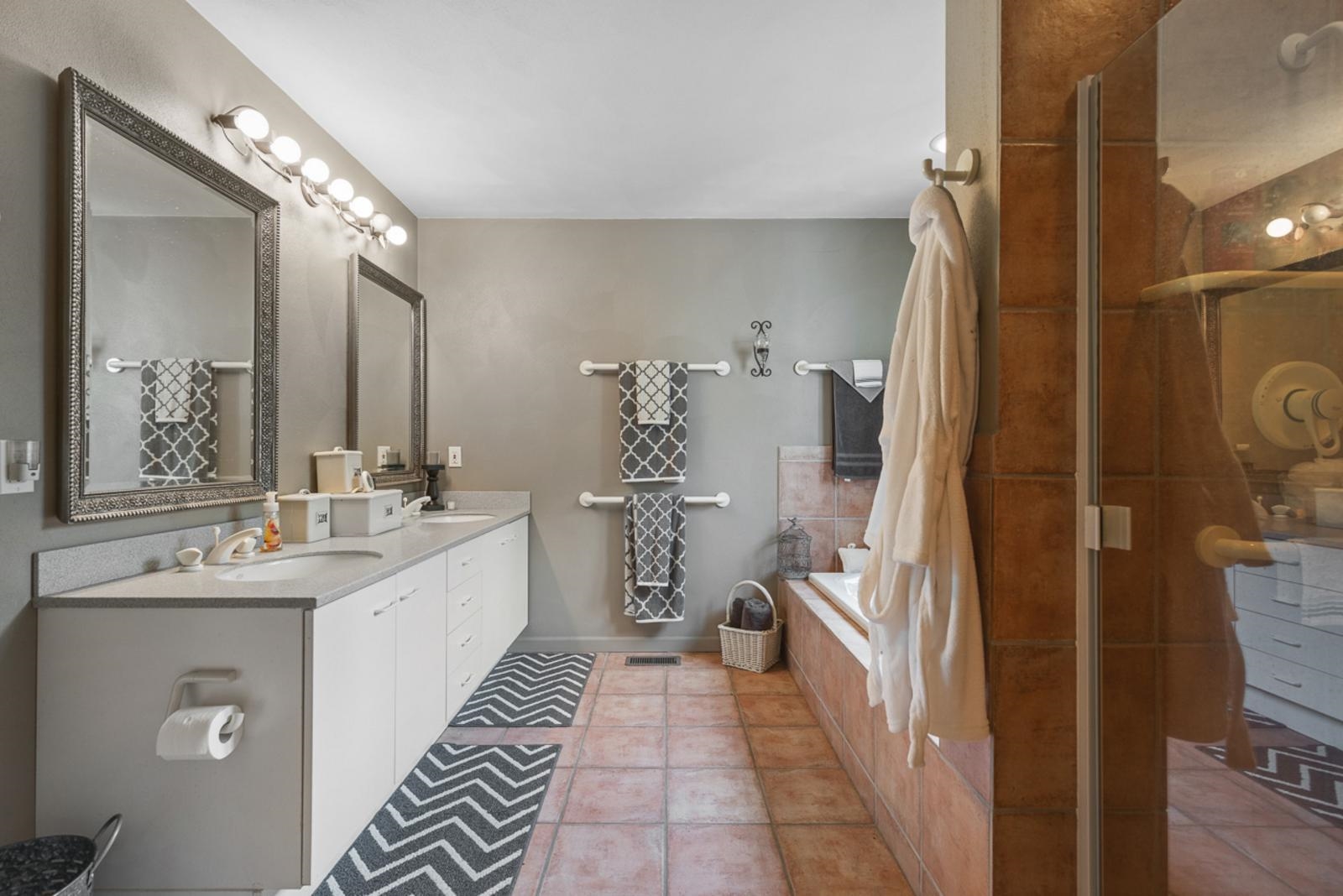 1511 West Demeter Drive Freeport, IL 61032 - Photo 41 of 78 a bathroom with a double vanity sink mirror and shower