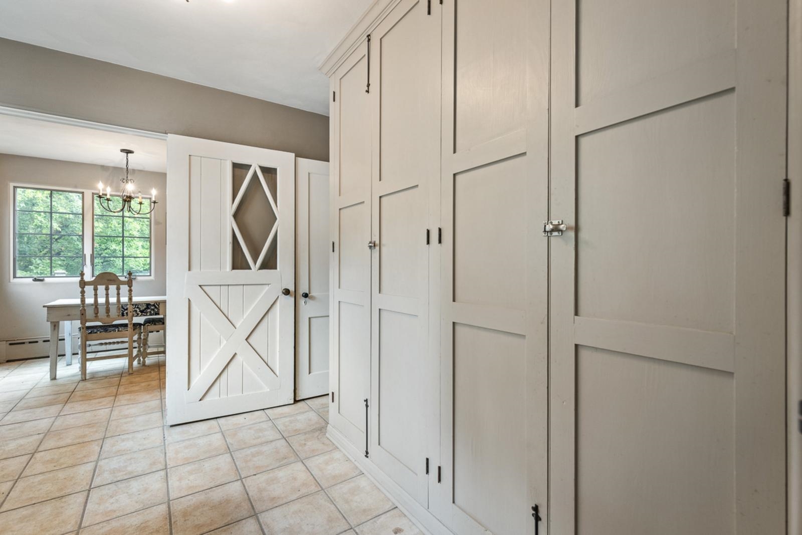 1511 West Demeter Drive Freeport, IL 61032 - Photo 48 of 78 a view of a entryway with furniture and floor to ceiling window