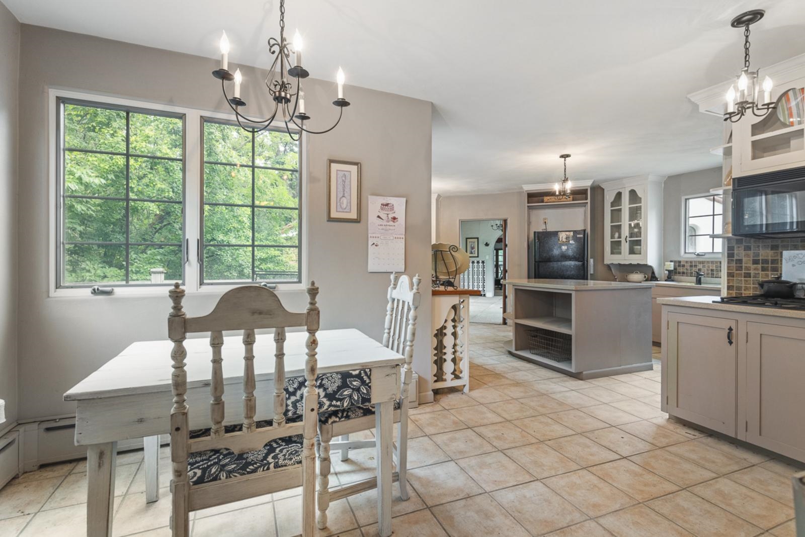 1511 West Demeter Drive Freeport, IL 61032 - Photo 49 of 78 a view of a dining room with furniture window and outside view