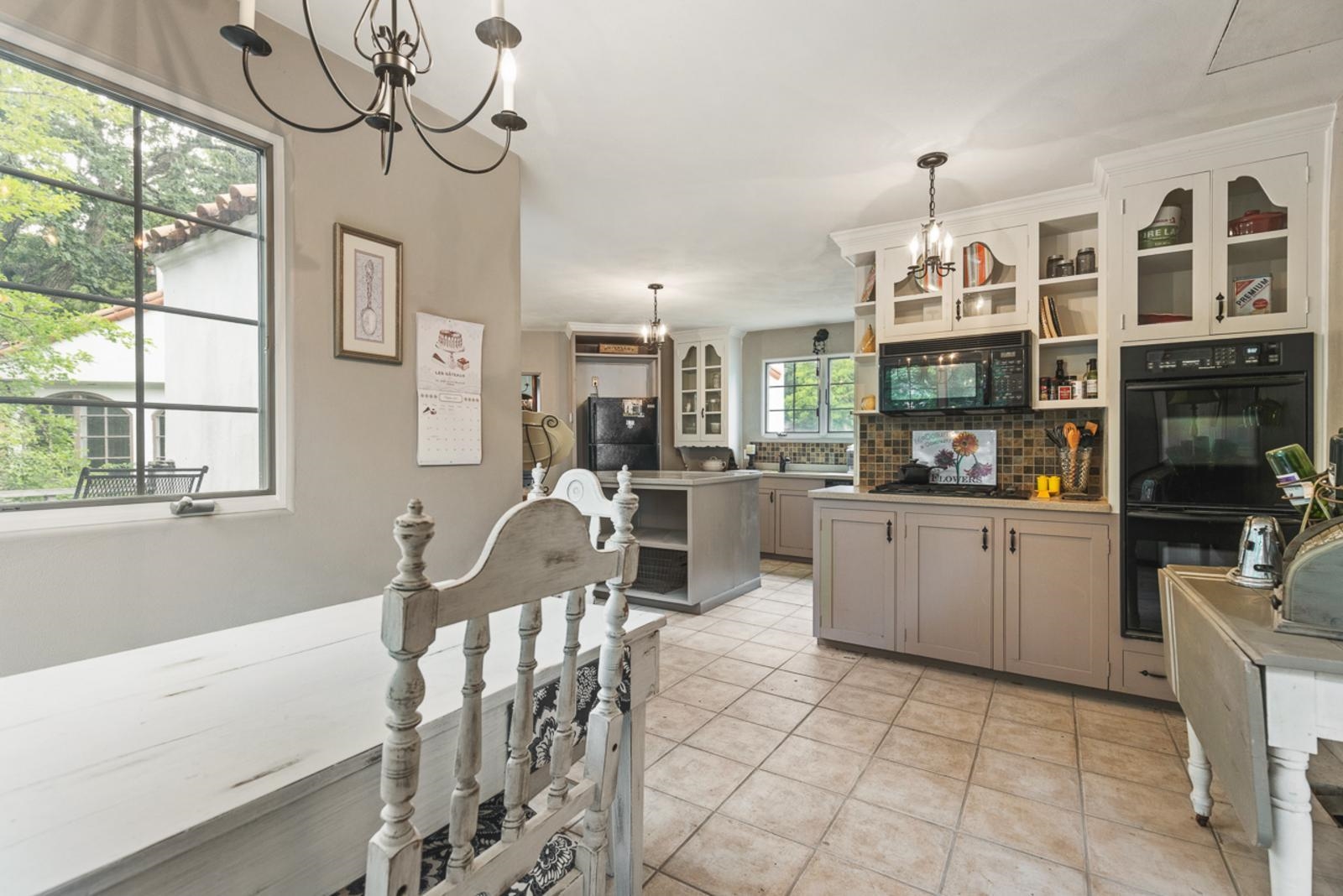 1511 West Demeter Drive Freeport, IL 61032 - Photo 50 of 78 a kitchen with stainless steel appliances kitchen island granite countertop a sink and cabinets