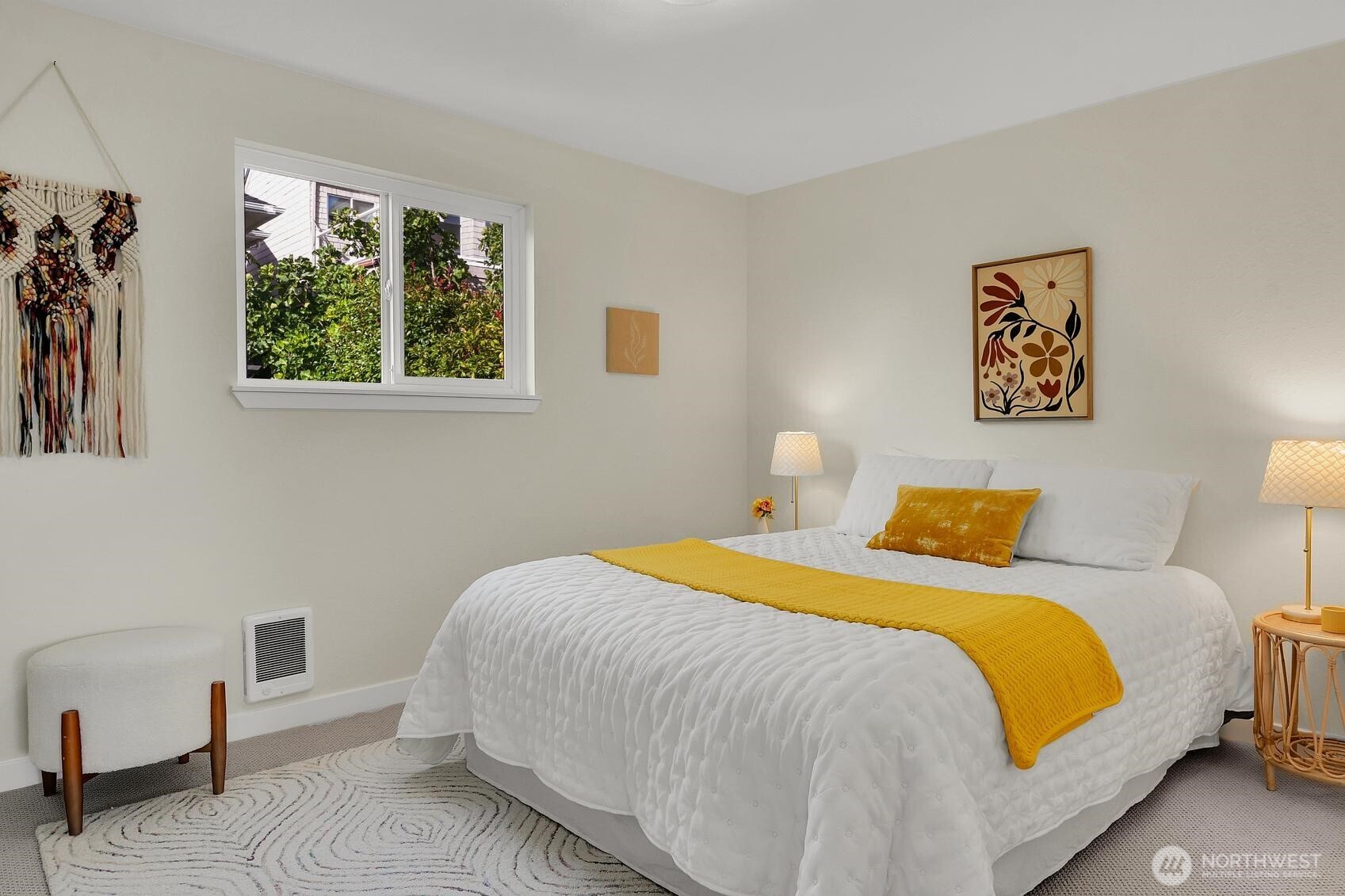 161 Valley Street Seattle, WA 98109 - Photo 24 of 40 a bedroom with a bed and a window