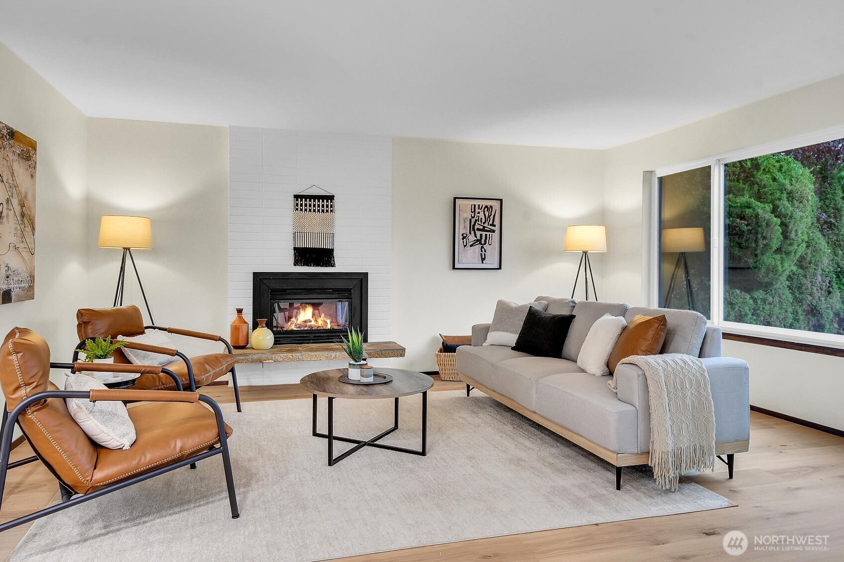 161 Valley Street Seattle, WA 98109 - Photo 26 of 40 a living room with furniture and a fireplace