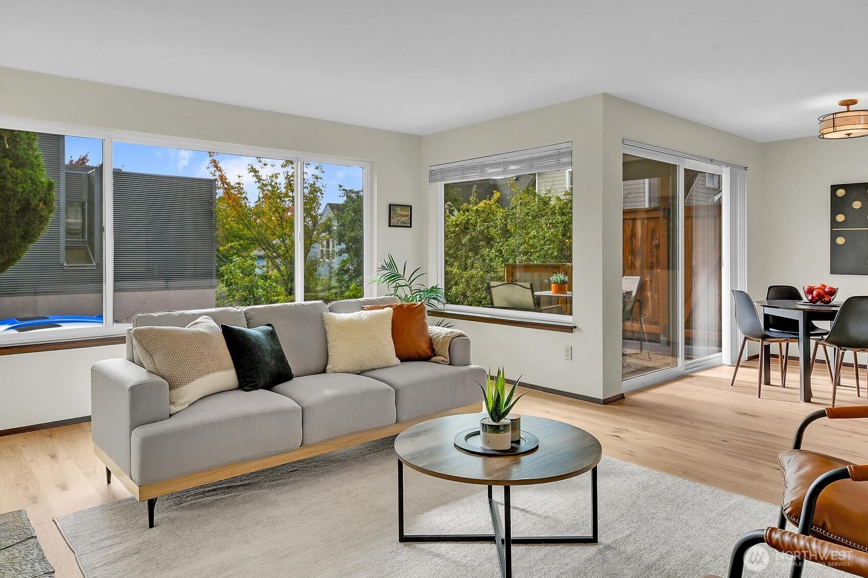 161 Valley Street Seattle, WA 98109 - Photo 27 of 40 a living room with furniture and a large window
