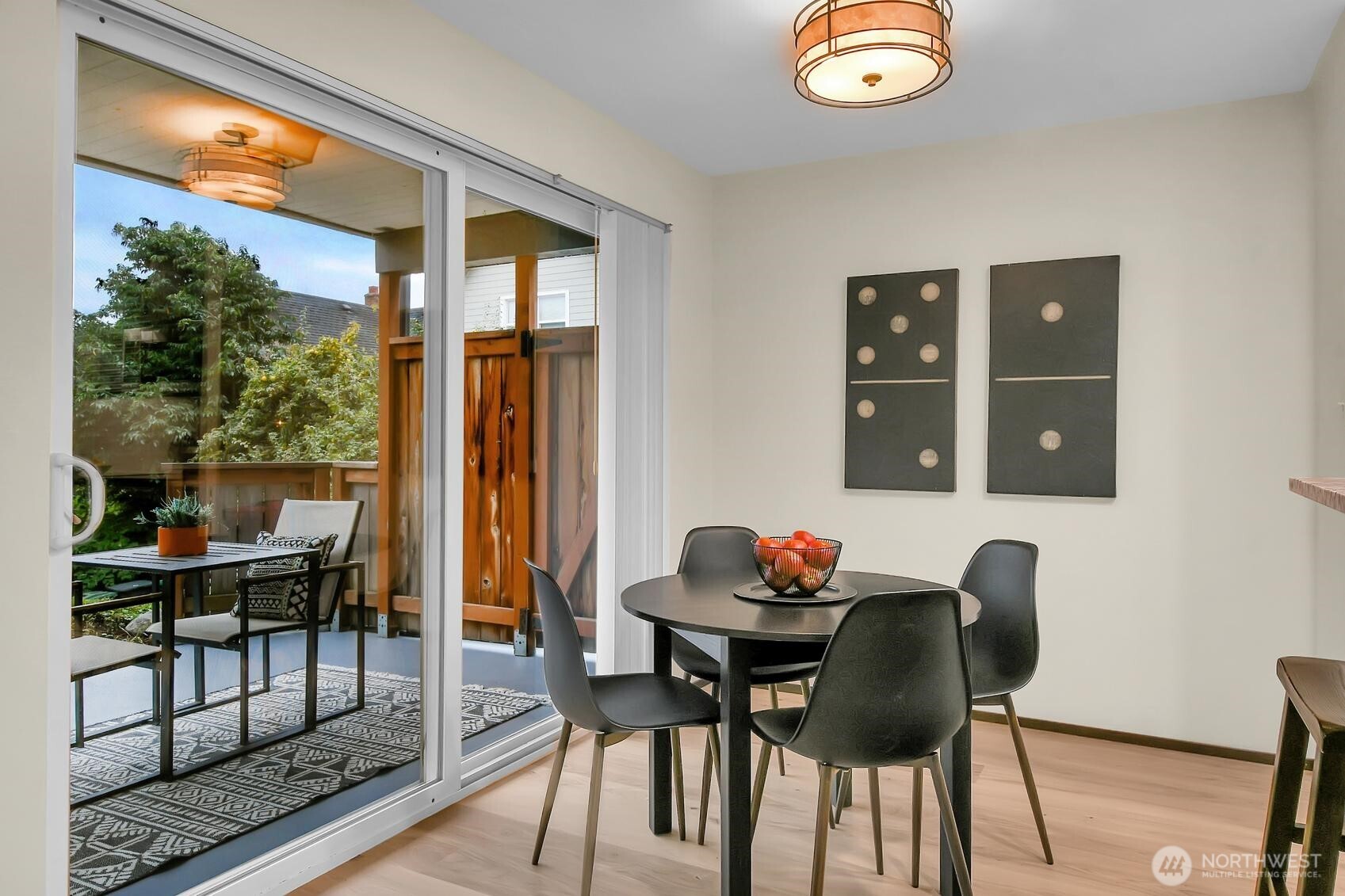 161 Valley Street Seattle, WA 98109 - Photo 29 of 40 a dining room with furniture and wooden floor