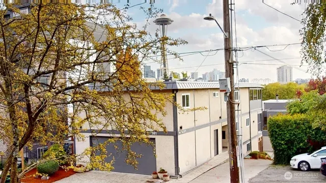 a view of a street with a building in the background