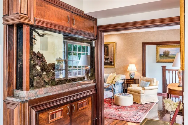 a living room with furniture and a window