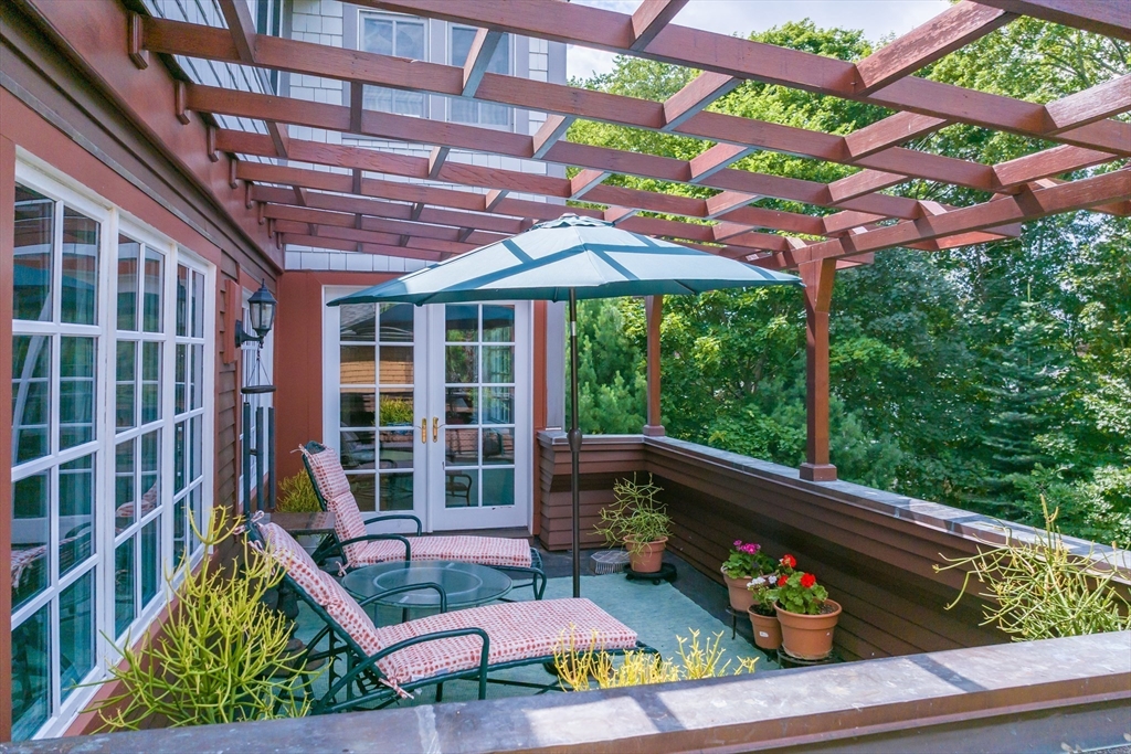 45 Parley Avenue Boston, MA 02130 - Photo 14 of 24 a view of a chairs and table in a patio