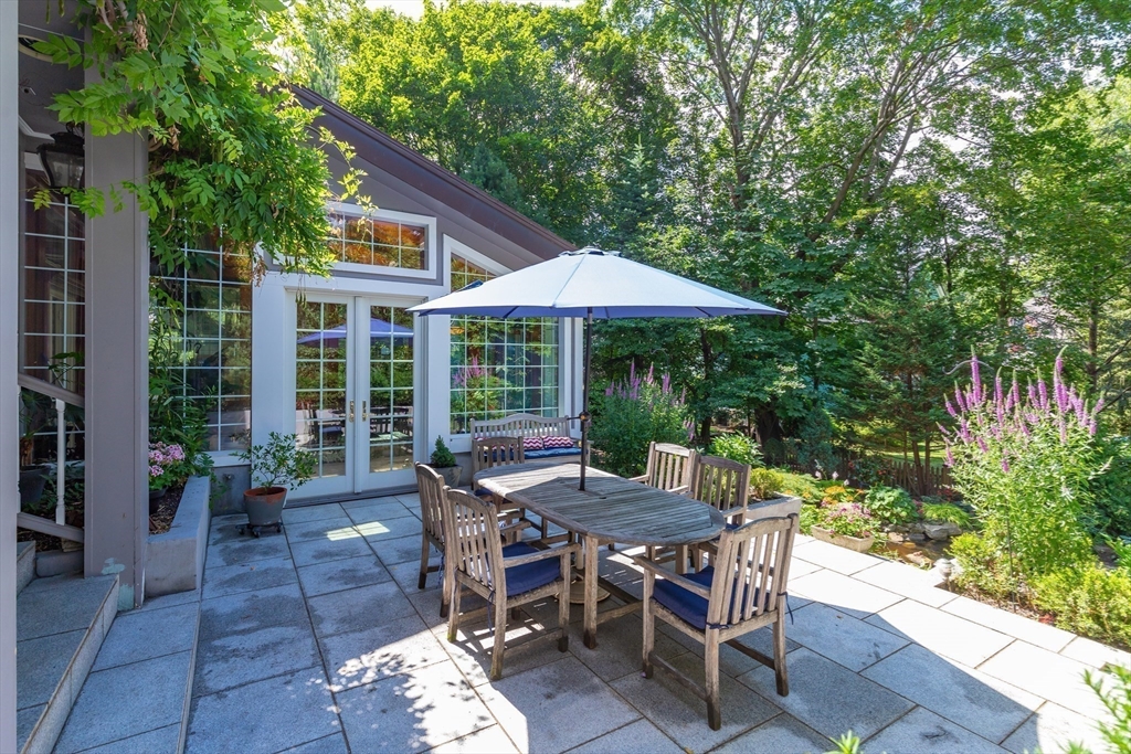 45 Parley Avenue Boston, MA 02130 - Photo 3 of 24 a view of a patio with furniture and wooden floor