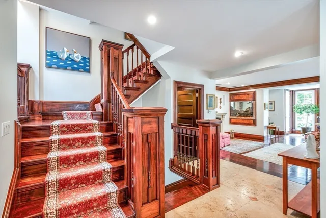 a view of entryway livingroom and hall