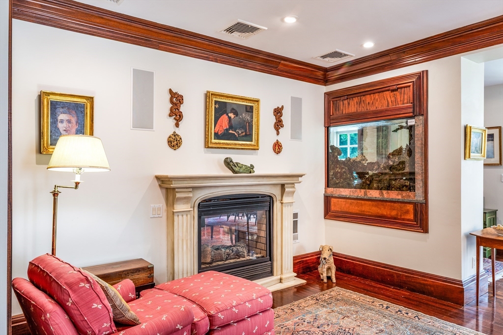 45 Parley Avenue Boston, MA 02130 - Photo 9 of 24 a bedroom with a bed and wooden floor
