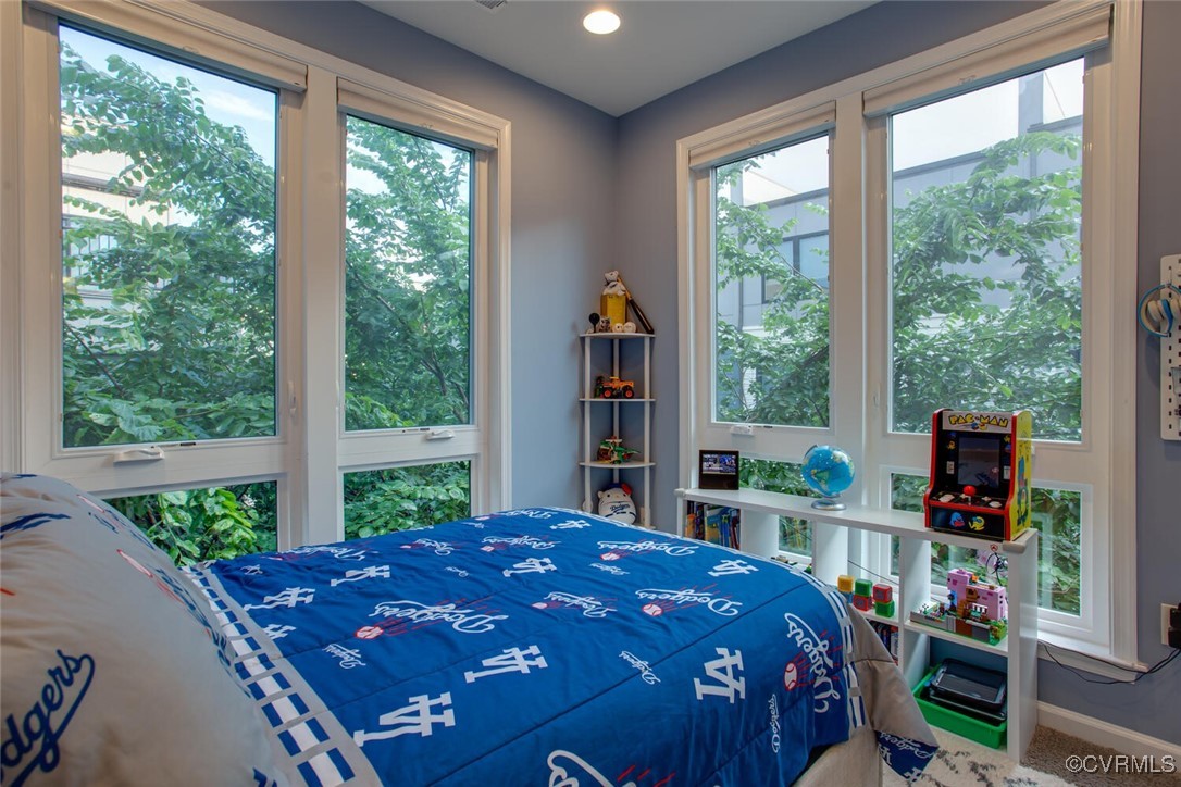447 Nottoway Walk Alexandria, VA 22304 - Photo 21 of 49 Bedroom with multiple windows and carpet floors