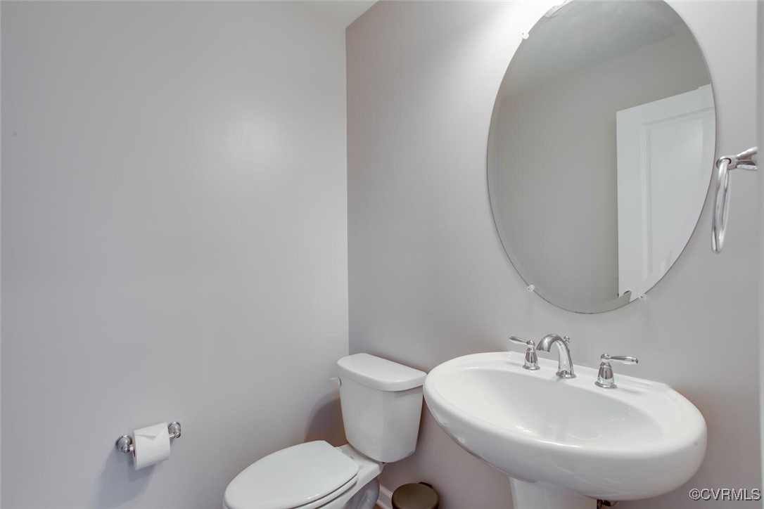 447 Nottoway Walk Alexandria, VA 22304 - Photo 26 of 49 Half bathroom featuring a sink and toilet
