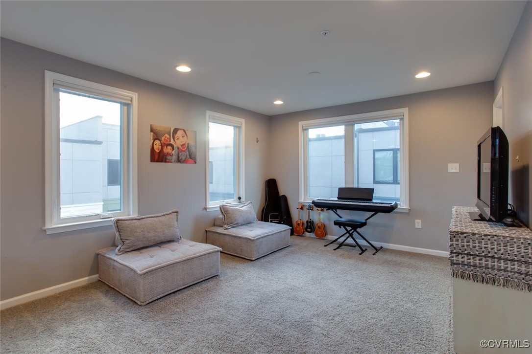 447 Nottoway Walk Alexandria, VA 22304 - Photo 32 of 49 Living area featuring carpet floors and recessed l