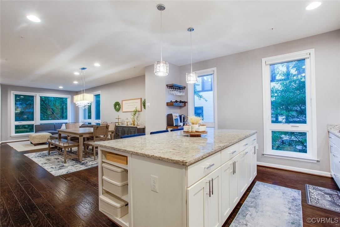 447 Nottoway Walk Alexandria, VA 22304 - Photo 34 of 49 Kitchen with dark wood-style floors, a center isla