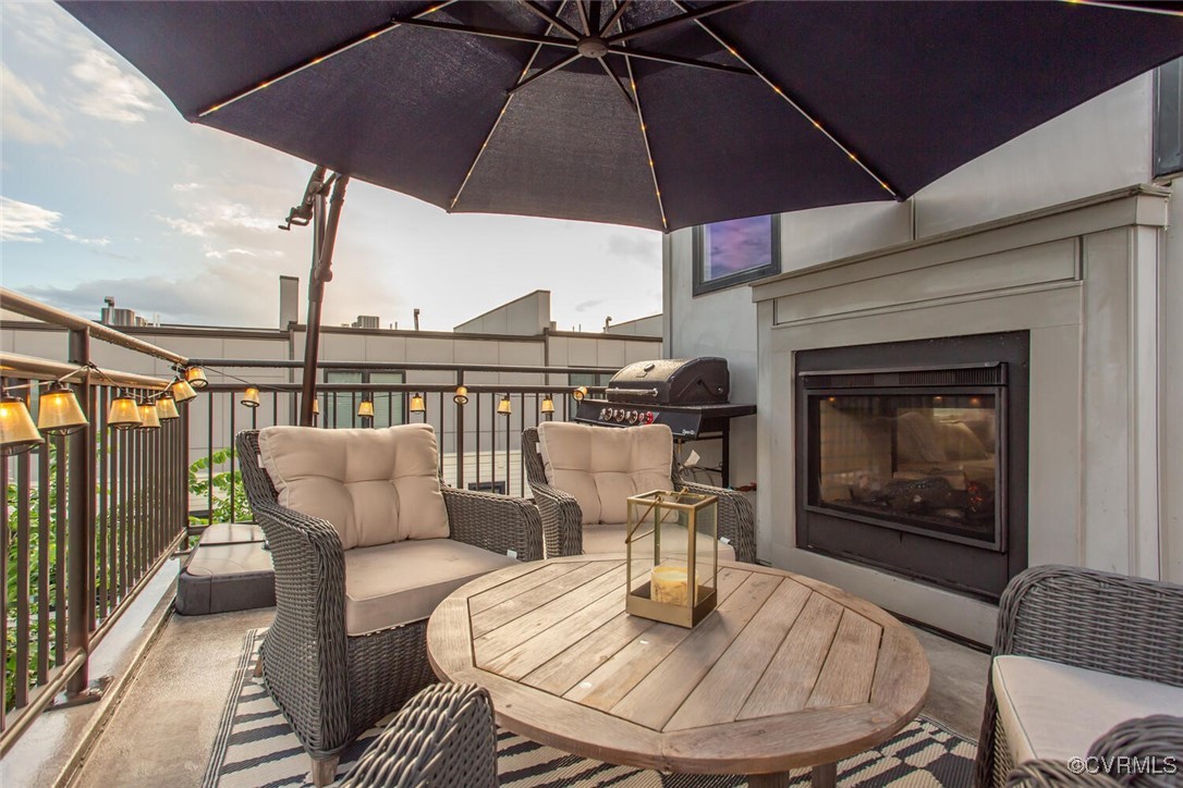 447 Nottoway Walk Alexandria, VA 22304 - Photo 5 of 49 View of patio featuring a glass covered fireplace