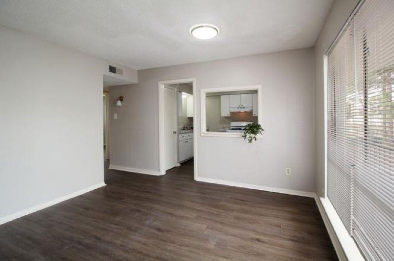 592 Patterson Street Memphis, TN 38111 - Photo 1 of 19 wooden floor in an empty room with a window