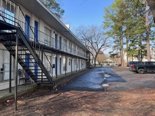 592 Patterson Street Memphis, TN 38111 - Photo 11 of 19 a view of a building with a yard