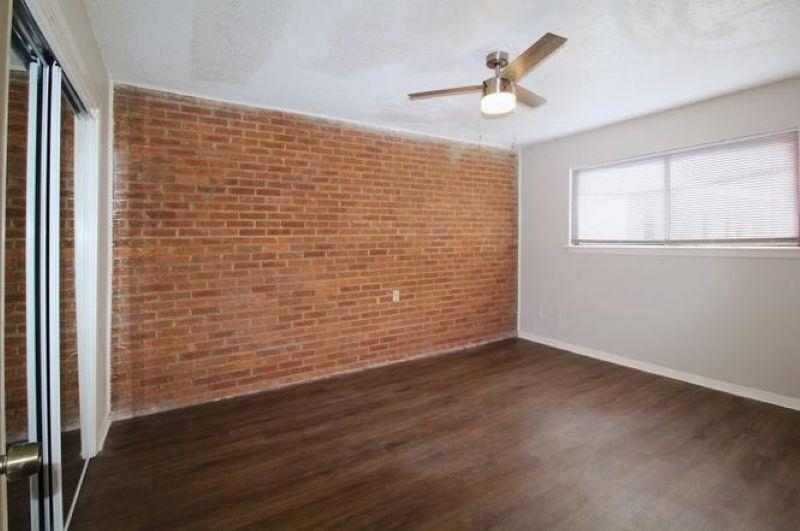 592 Patterson Street Memphis, TN 38111 - Photo 19 of 19 wooden floor in an empty room with a window