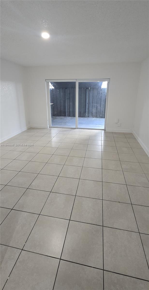 11150 Southwest 196th Street, Unit 104 Cutler Bay, FL 33157 - Photo 2 of 18 a view of room and window