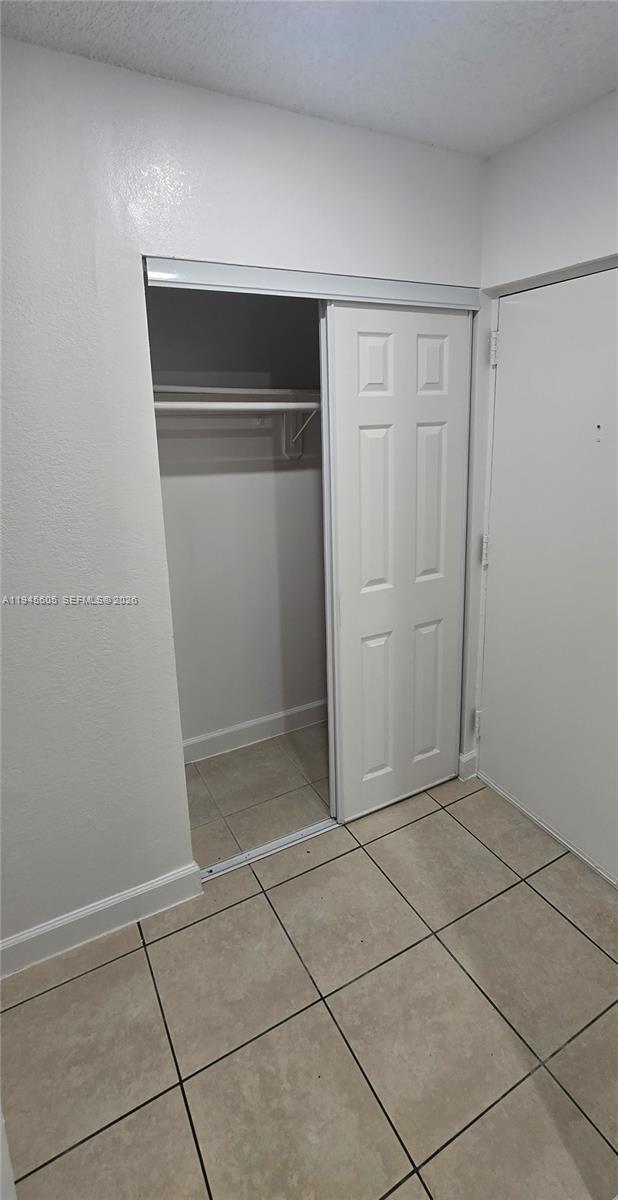 11150 Southwest 196th Street, Unit 104 Cutler Bay, FL 33157 - Photo 4 of 18 a view of an empty room