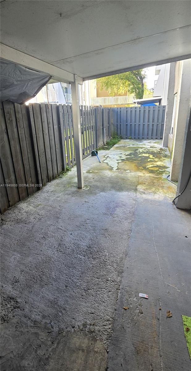 11150 Southwest 196th Street, Unit 104 Cutler Bay, FL 33157 - Photo 7 of 18 a view of water heater room with wooden floor