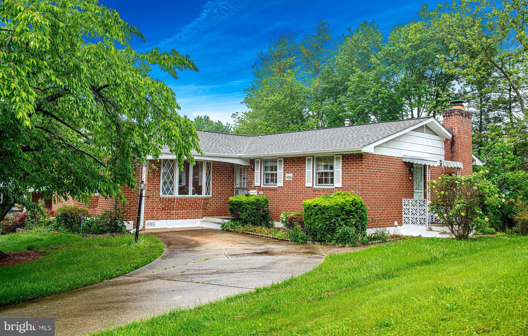 1607 Weyburn Road Rosedale, MD 21237 - Photo 1 of 36 front view of a house and a yard