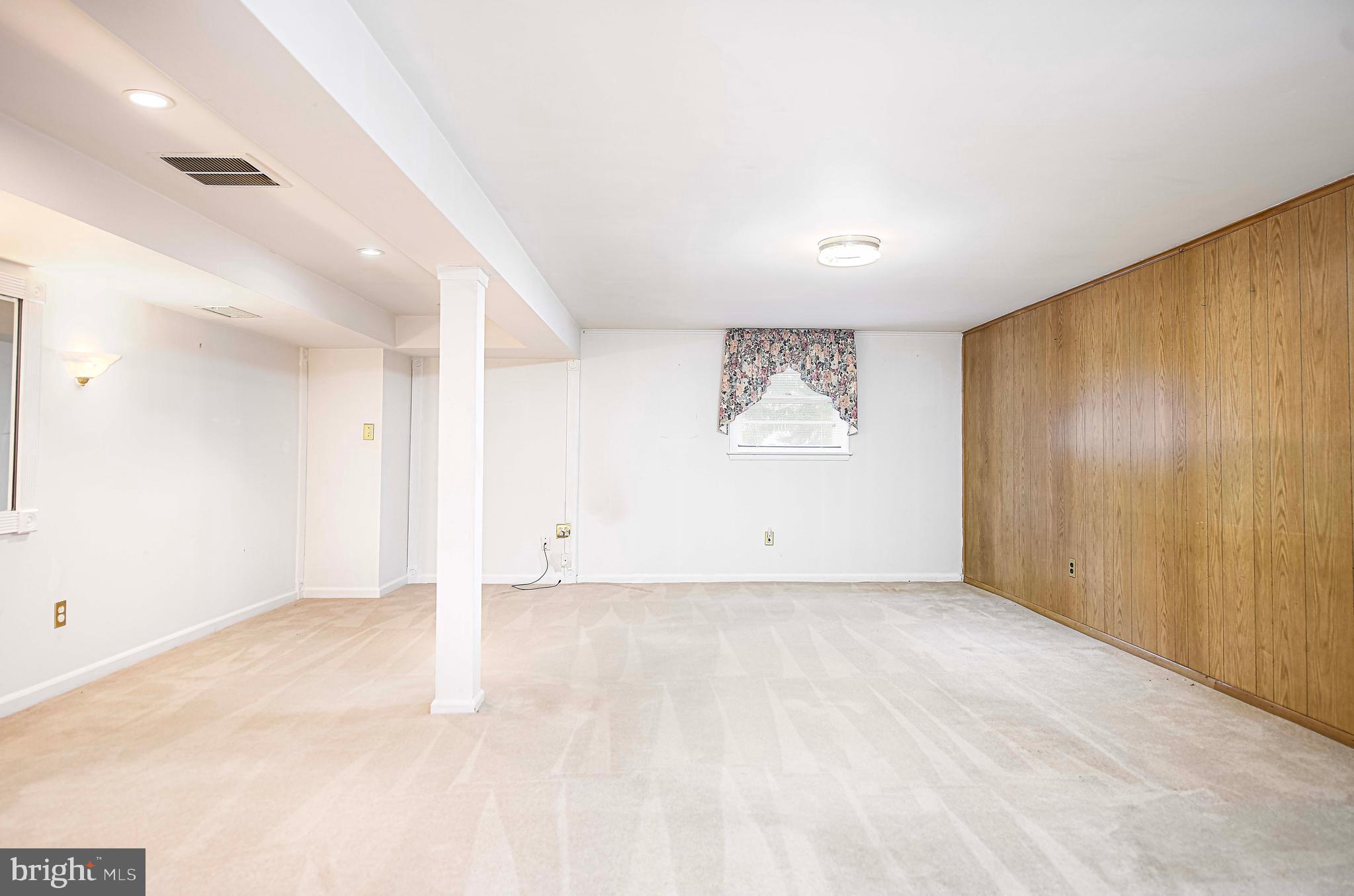 1607 Weyburn Road Rosedale, MD 21237 - Photo 17 of 36 a view of an empty room with a window