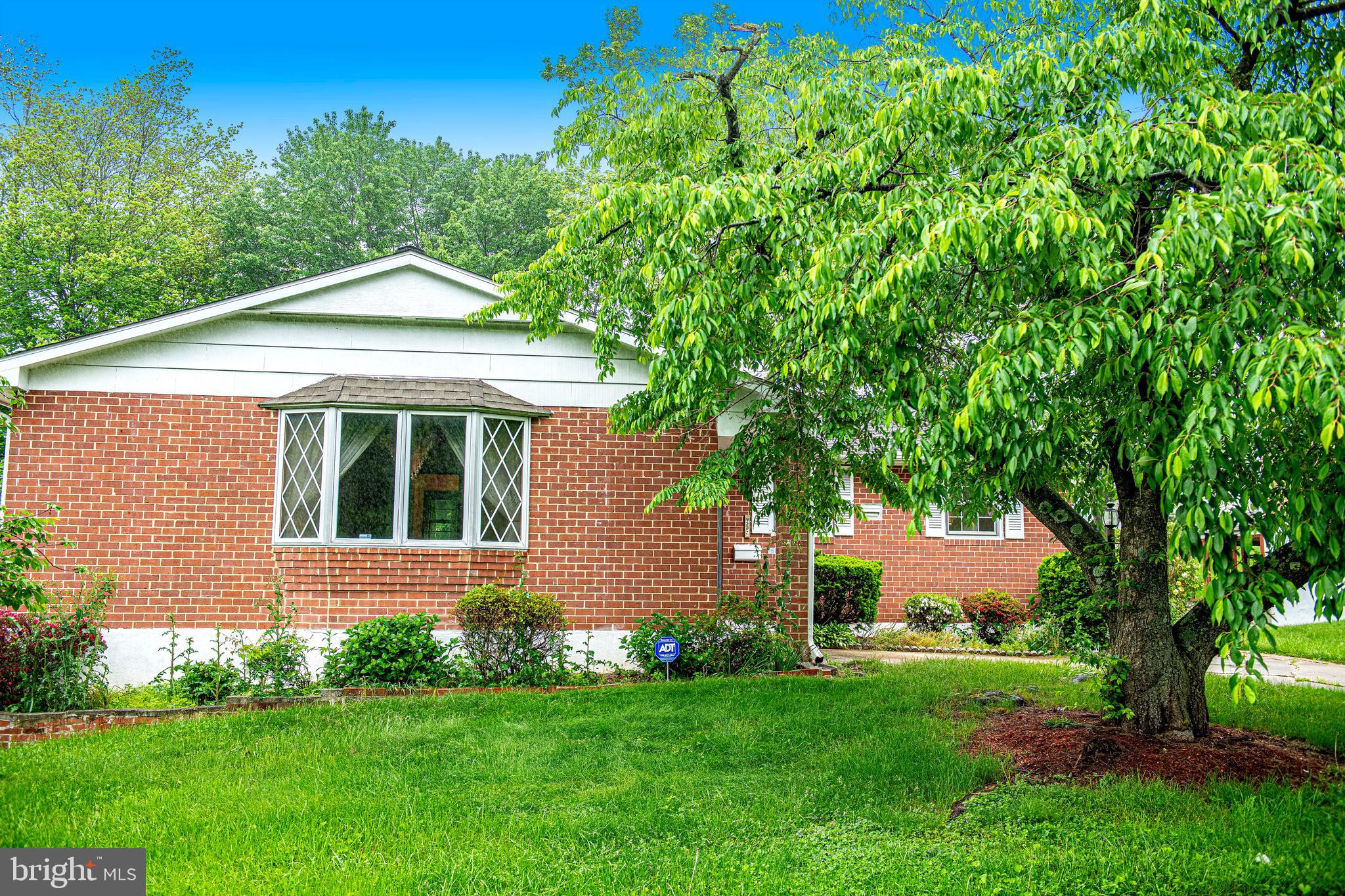 1607 Weyburn Road Rosedale, MD 21237 - Photo 2 of 36 a front view of a house with a yard