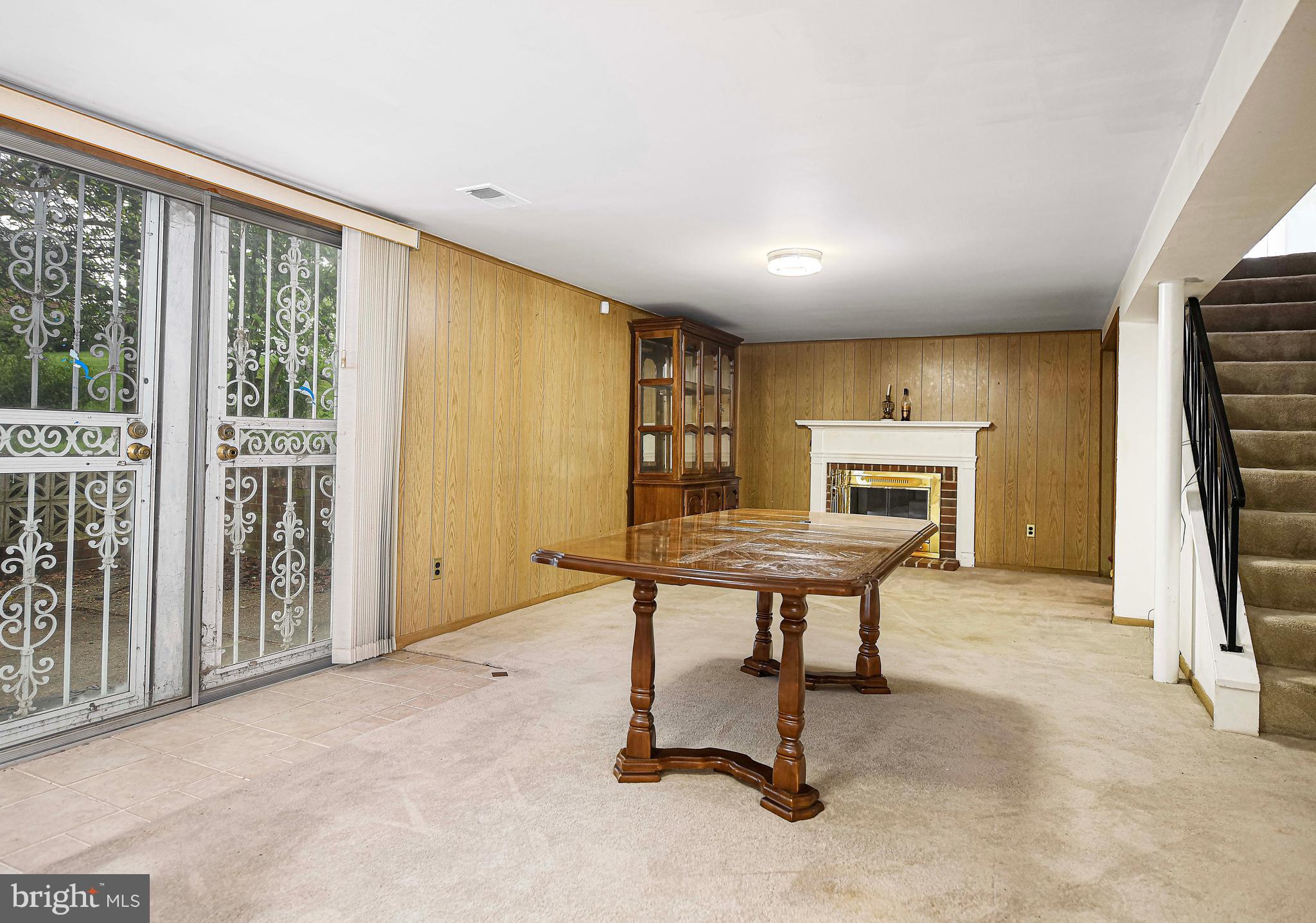 1607 Weyburn Road Rosedale, MD 21237 - Photo 25 of 36 a view of a livingroom with a table and chairs