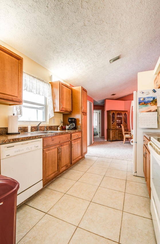4342 Southwest Lagrange Street Port St. Lucie, FL 34953 - Photo 6 of 22 DSC_6300_1_2_3_4_5_6