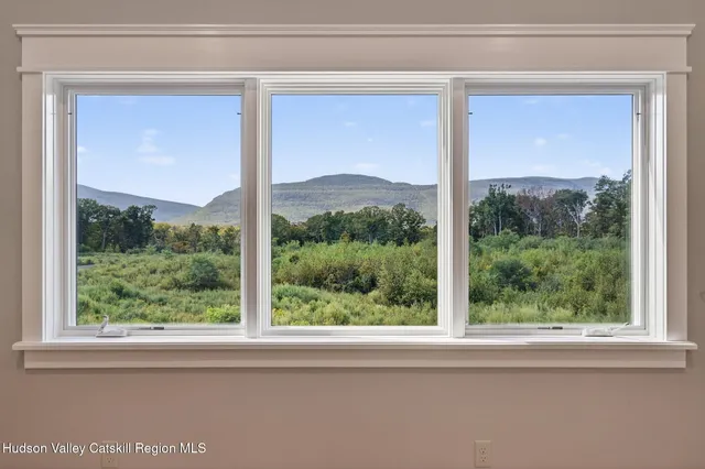 a view of a room that has a window