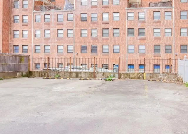 front view of a building with a street