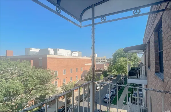 a view of a balcony with an outdoor space