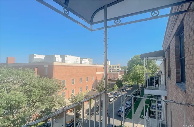 a view of a balcony with an outdoor space