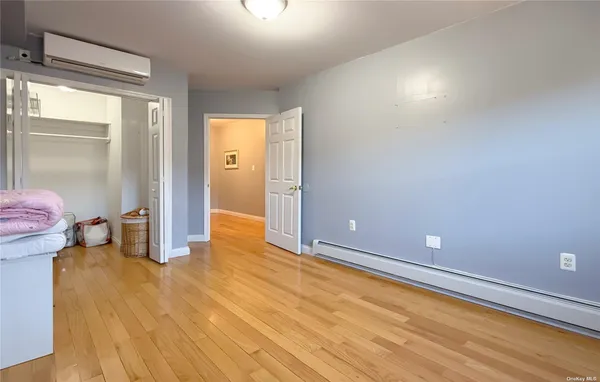 a bedroom with a bed and a table